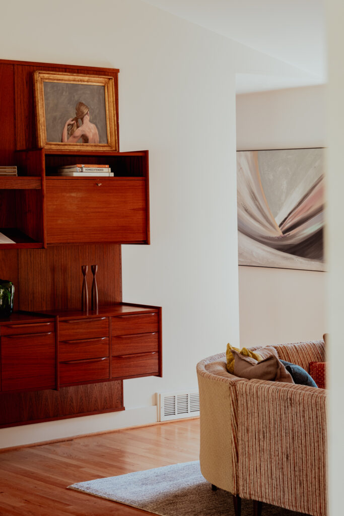 Layered, collected living room in a Providence home by Hayden Home Studio
