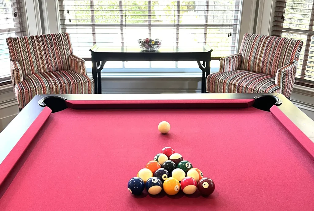 Pool table in an Eastover game room, styled by Hayden Home Studio, Charlotte NC