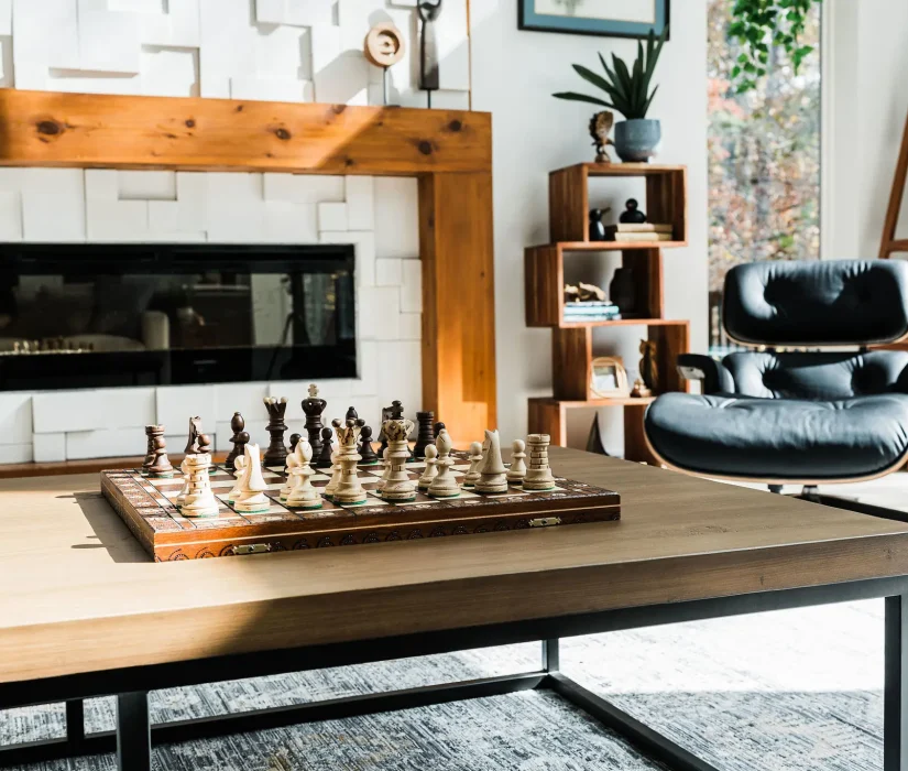 Chess set decoration on living room table designed by Hayden Home Studio in Charlotte NC